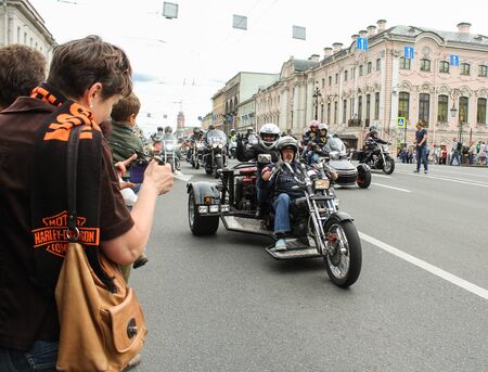 Bikers tricycle on the Green Bridge over the Moika River. The annual parade of Harley Davidson in the squares and streets of St. Petersburg.のeditorial素材