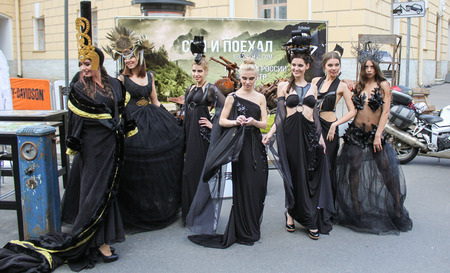Group of girls posing. Girls model in designer dress posing on the street.のeditorial素材