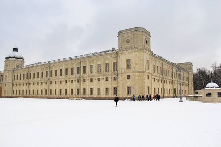 Group of tourists near the Gatchina Palace. Visit the Gatchina Palace as part of a cultural forum in St. Petersburg.のeditorial素材