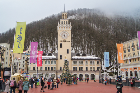 People in the area Rosa Khutor. Houses and hotels in mountain-skiing village of Rosa Khutor.のeditorial素材