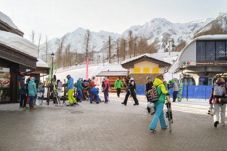 People at the cable car station. The complex mountain-ski runs and facilities in the village of Rosa Khutor.のeditorial素材