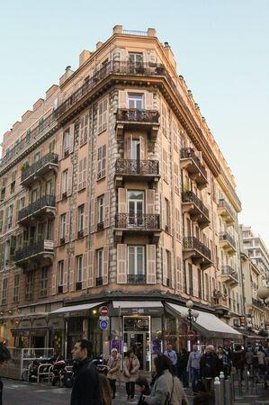 People in the city. Urban architecture of the old French style.のeditorial素材