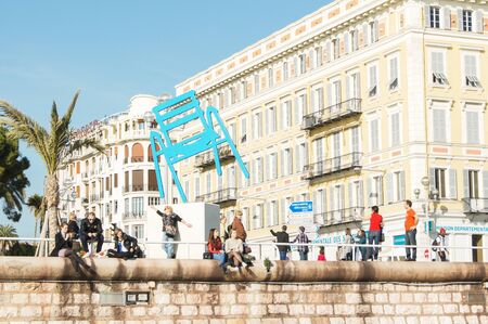 Tourists on the waterfront. People vacationing in Nice on the Cote d'Azur.のeditorial素材