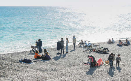 People rest on the shore. People and tourists having a rest on the Cote d'Azur.のeditorial素材