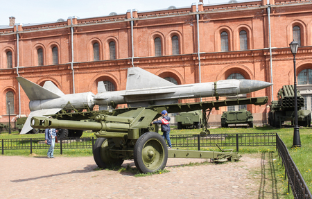 The boy is on the cannon gun. Military History Museum of combat equipment in St. Petersburg Petersburg.のeditorial素材
