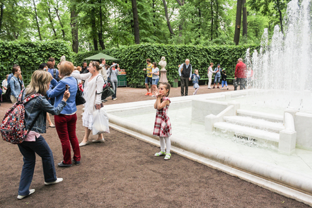 Walking through the Summer Garden of St. Petersburg in cloudy, rainy weather.のeditorial素材