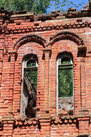 The ruins of an ancient monastery in a thicket of wild forest.の写真素材