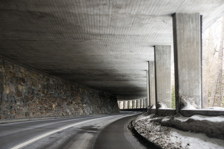 Driving by car through mountain tunnels.の写真素材