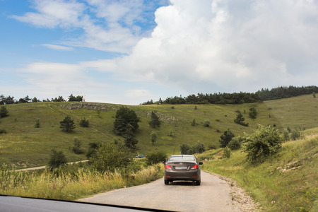 Views from the window of a moving car on the roads of the Crimea.のeditorial素材