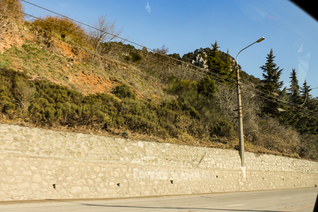 Crimean views from the car window at the junction of winter and spring.の写真素材