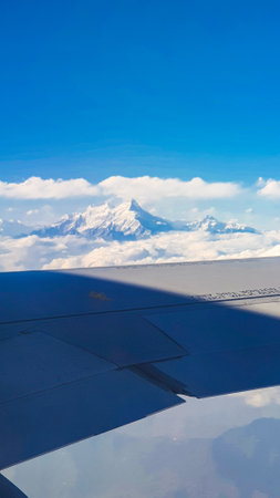 Flight over Himalayan mountain peaks.