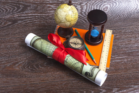 Tools traveler - Compass, globe, map, pencil, ruler.の写真素材
