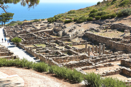 The ruins of the ancient acropolis on a background of a sea landscape on the island of Rhodes in Greece.の写真素材