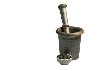 Isolated mortar with pestle and calyx with pepper.の写真素材