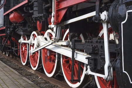Fragment of the retro-locomotive chassis at the railway station.の写真素材