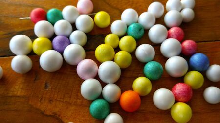 Colorful bubbles on wood backgroundの写真素材