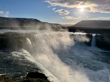 Godafoss waterfall in Iceland during golden hour on a sunny dayの写真素材