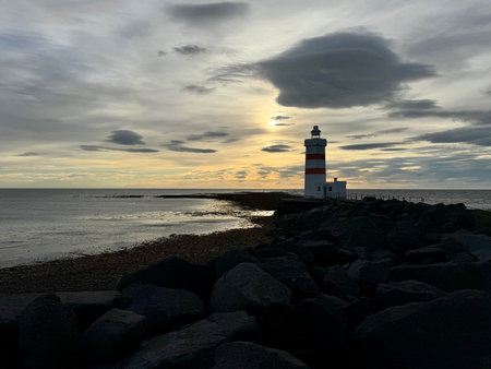 Gardur Lighthouse in soft evening light after a storm, Icelandの写真素材