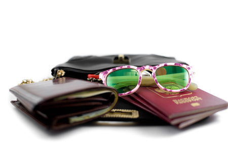 photo handbags for travel with a purse, sunglasses, passportsの写真素材