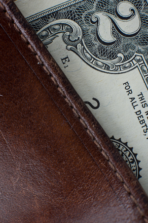 US two dollars and wallet in macro