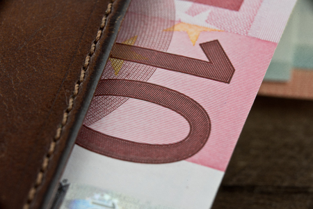 Wallet and Euro bill, super close up