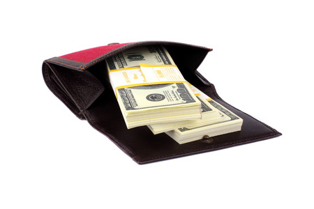 Red purse and money on a white backgroundの写真素材