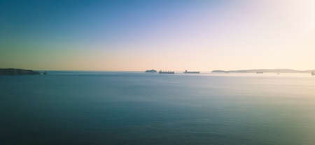 Aerial view of the sea and the ships at sunset. Beautiful seascape.の写真素材