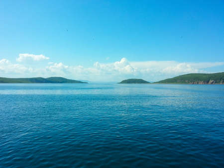 Beautiful seascape with blue sky and white clouds.の写真素材