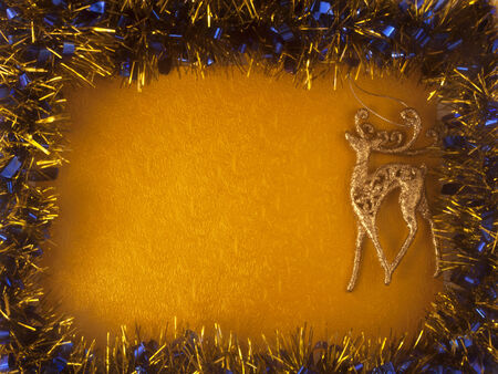 Golden Christmas card with garlands and Christmas deerの写真素材