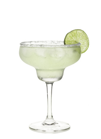Glass of margarita cocktail on a white background.の写真素材