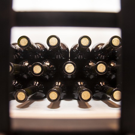 Bottles of high quality wine in the traditional wine cellar