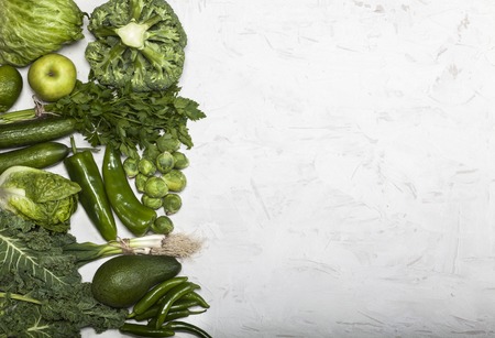 Green health food, fruits and vegetables. Top view with copy space.