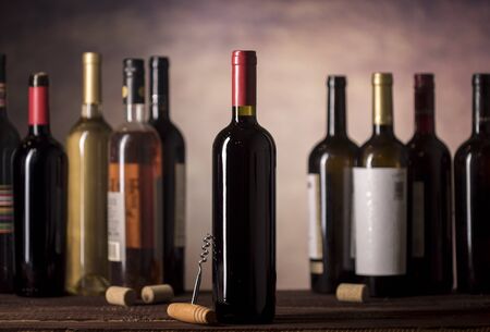 Wine buttles collection on dark background