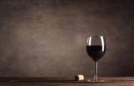 Red Wine in glass on dark background with copy spaceの写真素材
