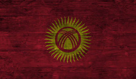 Kyrgyzstan flag with waving grunge texture. Vector background.のイラスト素材