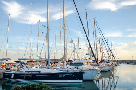 Rome, Italy - October 2015: Yachts and boats docked at the pier in the sea at the port of Rome in...
