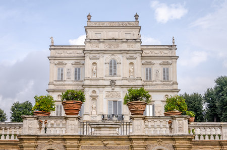Historically, an important architectural building landmark castle with garden and flowers and shrubs ladshaftnym design in the form of labyrinth in park at Villa Pamphili in Rome, capital of Italyのeditorial素材