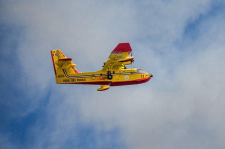 ROMA, ITALY - JULY 2017: Firefighting aircraft Bombardier CL-415 in an emergency situation, during a...