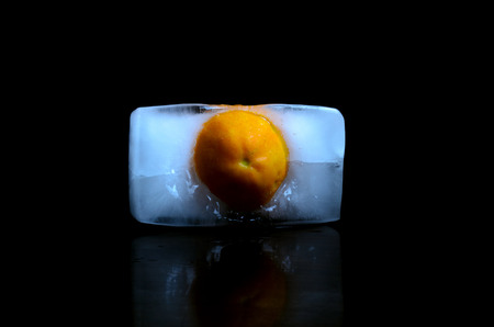 Yellow fresh mandarin isolated on white backgroundの写真素材