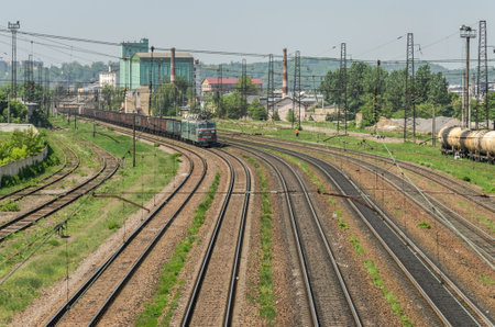 LVIV, UKRAINE - MAY 2018: A freight train rides the railway station