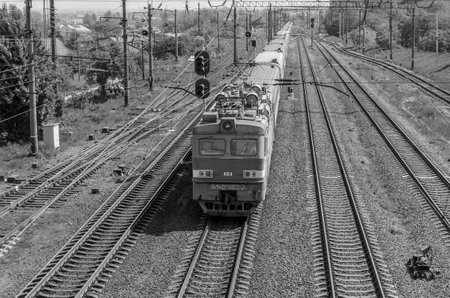 LVIV, UKRAINE - MAY 2018: A freight train rides the railway stationのeditorial素材
