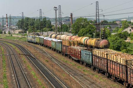LVIV, UKRAINE - MAY 2018: A freight train rides the railway stationのeditorial素材