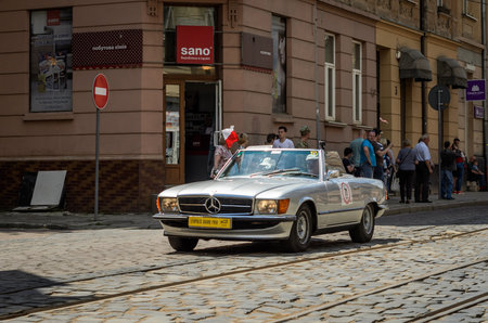 LVIV, UKRAINE - JUNE 2018: Old vintage retro Mercedes car rides through the streets of the cityのeditorial素材