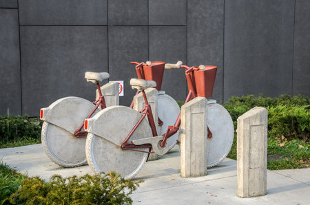 POLAND, KRAKOW - NOVEMBER 2018: Monument bike parking with concrete bikes