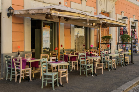 ROMA, ITALY - AUGUST 2018: Terrace of the Italian restaurant in the streetのeditorial素材