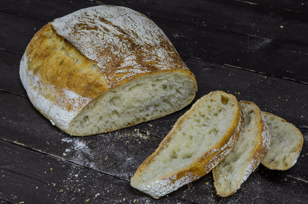 Freshly baked homemade bread on a wooden table