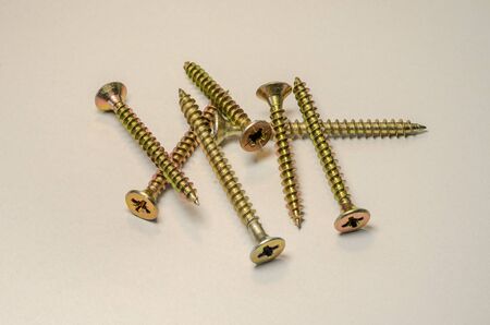 Building screws on a light background