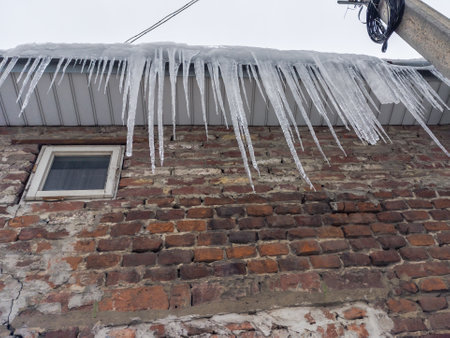Large icicles on the roof of the building