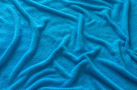 Wavy texture of fleecy blue fabricの写真素材