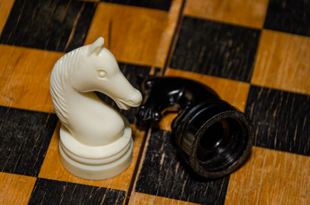Man playing chess on a chessboardの写真素材